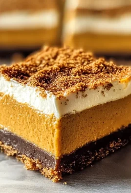 Pumpkin Cheesecake Bars with Gingersnap Crust