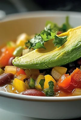 Delicious Warm Avocado & Vegetable Stew with Spinach and Beans