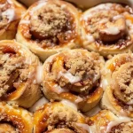 Peach Cobbler Cinnamon Rolls with Crumb Topping